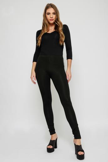 amnesia-trudi-oldalt-csikos-leggings-fekete